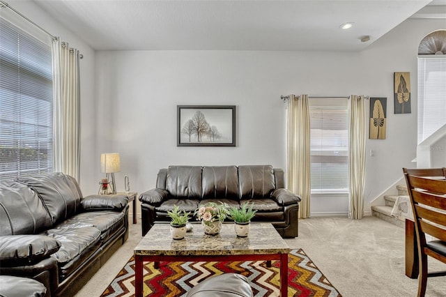 344 Cadiz Loop, Davenport, FL 33837 - living room featuring light colored carpet and stairs
