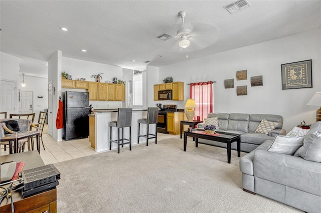 344 Cadiz Loop, Davenport, FL 33837 - living room featuring a ceiling fan, light colored carpet, and recessed lighting