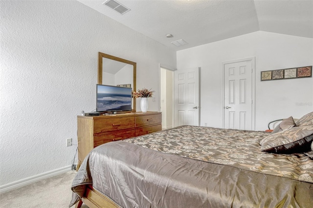 344 Cadiz Loop, Davenport, FL 33837 - carpeted bedroom with a textured wall, baseboards, and vaulted ceiling