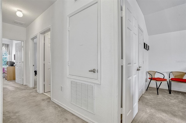 344 Cadiz Loop, Davenport, FL 33837 - hallway with light carpet and baseboards