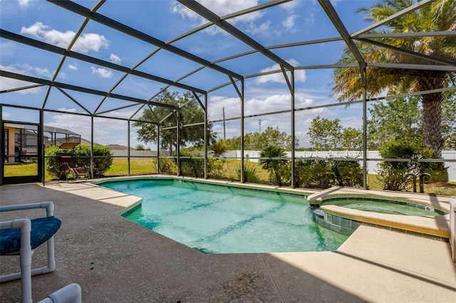 344 Cadiz Loop, Davenport, FL 33837 - view of swimming pool with a patio area, a pool with connected hot tub, and a lanai