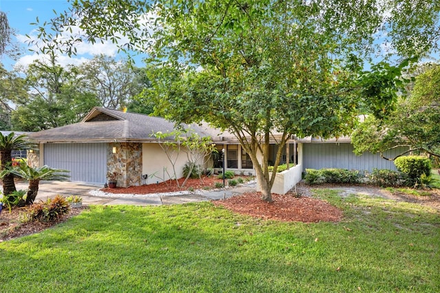 311 Needles Trl, Longwood, FL 32779 - view of front of home with a front lawn and roof with shingles