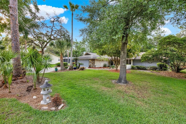 311 Needles Trl, Longwood, FL 32779 - view of front of house with a front lawn