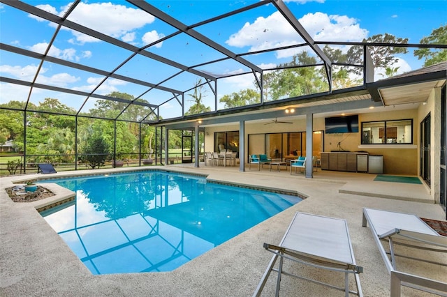 311 Needles Trl, Longwood, FL 32779 - swimming pool with an outdoor hangout area, a patio area, a ceiling fan, and glass enclosure