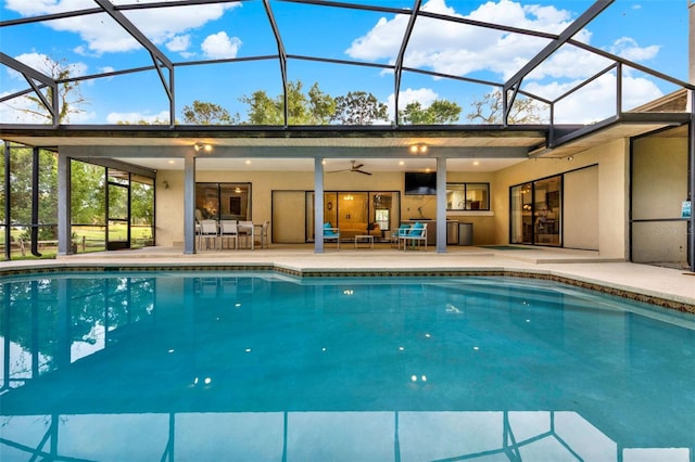 311 Needles Trl, Longwood, FL 32779 - outdoor pool featuring ceiling fan, a patio, outdoor lounge area, and glass enclosure