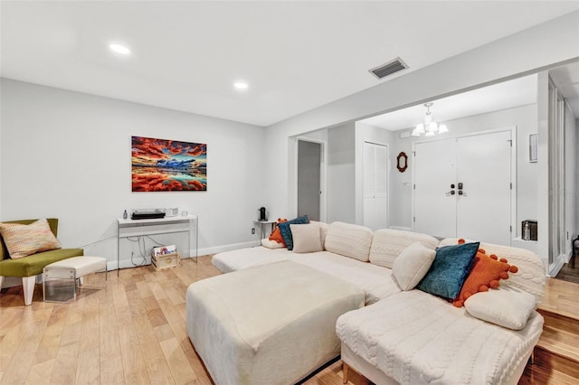 311 Needles Trl, Longwood, FL 32779 - living area featuring light wood finished floors, a chandelier, baseboards, and recessed lighting