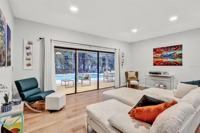 311 Needles Trl, Longwood, FL 32779 - living area featuring wood finished floors, recessed lighting, and baseboards