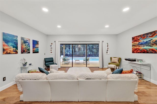 311 Needles Trl, Longwood, FL 32779 - living area featuring recessed lighting, baseboards, and light wood-style flooring
