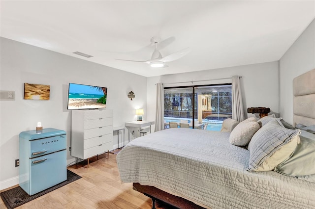 311 Needles Trl, Longwood, FL 32779 - bedroom featuring baseboards, light wood-style flooring, and a ceiling fan