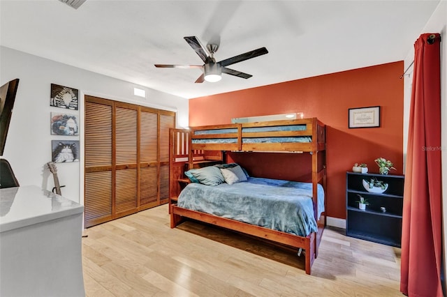 311 Needles Trl, Longwood, FL 32779 - bedroom featuring light wood-style flooring, a closet, and ceiling fan