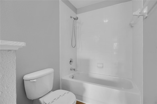 full bathroom with toilet and bathtub / shower combination