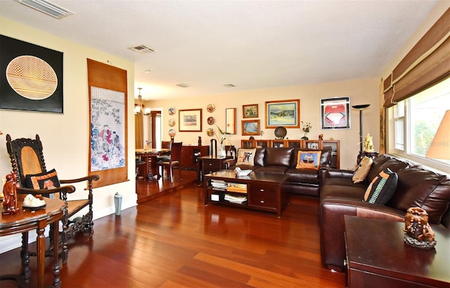 2900 Cullen Lake Shore Dr, Belle Isle, FL 32812 - living area featuring wood finished floors and a chandelier