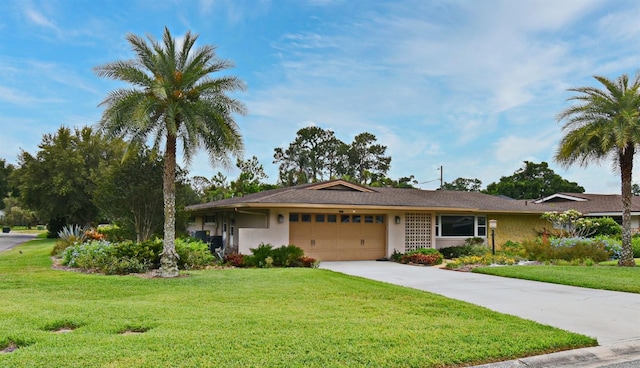 2900 Cullen Lake Shore Dr, Belle Isle, FL 32812 - single story home featuring a garage, a front lawn, concrete driveway, and stucco siding