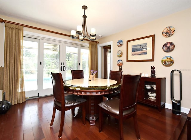 2900 Cullen Lake Shore Dr, Belle Isle, FL 32812 - dining room featuring a chandelier, dark wood-style floors, and french doors