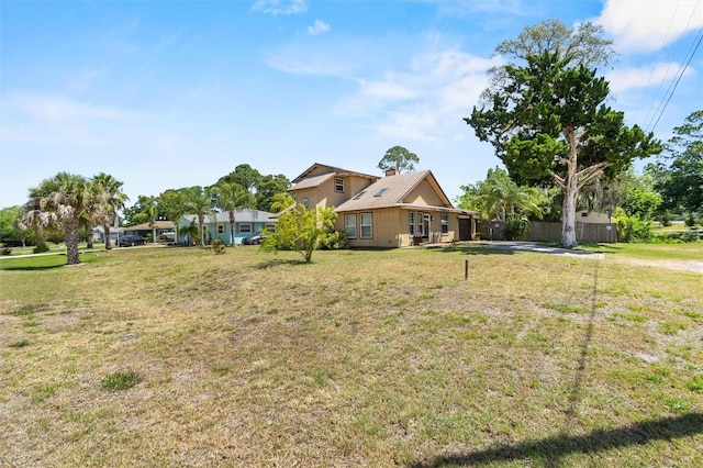 view of yard with fence