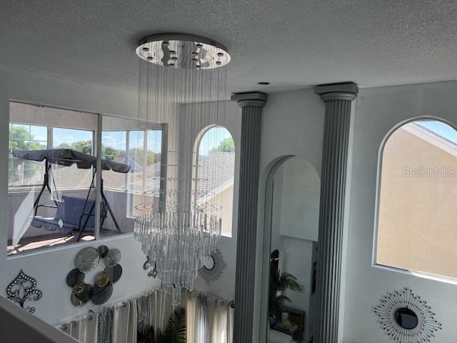 interior details featuring a textured ceiling