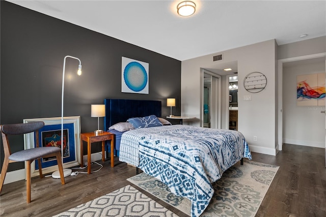 111 Crown Oaks Way Unit 101, Longwood, FL 32779 - bedroom with wood finished floors and baseboards