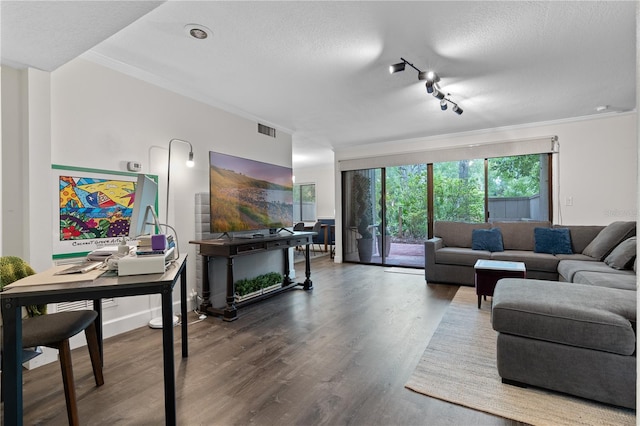 111 Crown Oaks Way Unit 101, Longwood, FL 32779 - living room featuring wood finished floors, ornamental molding, a textured ceiling, and track lighting