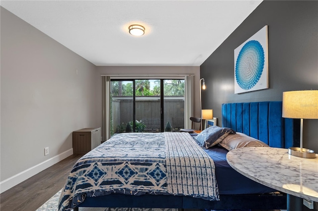 111 Crown Oaks Way Unit 101, Longwood, FL 32779 - bedroom with wood finished floors and baseboards