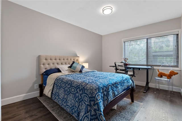 111 Crown Oaks Way Unit 101, Longwood, FL 32779 - bedroom with baseboards and wood finished floors