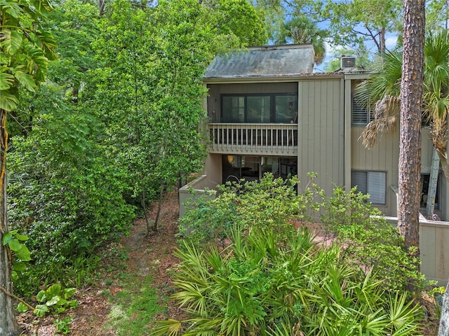111 Crown Oaks Way Unit 101, Longwood, FL 32779 - back of property with a chimney