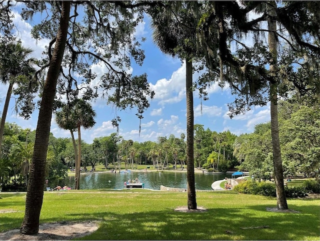 111 Crown Oaks Way Unit 101, Longwood, FL 32779 - view of property's community featuring a water view and a yard