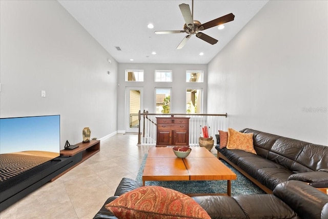 13865 Granger Ave, Orlando, FL 32827 - living room with ceiling fan, high vaulted ceiling, recessed lighting, light tile patterned floors, and visible vents