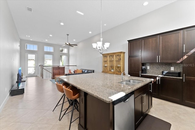13865 Granger Ave, Orlando, FL 32827 - kitchen featuring a sink, dishwasher, recessed lighting, backsplash, and visible vents
