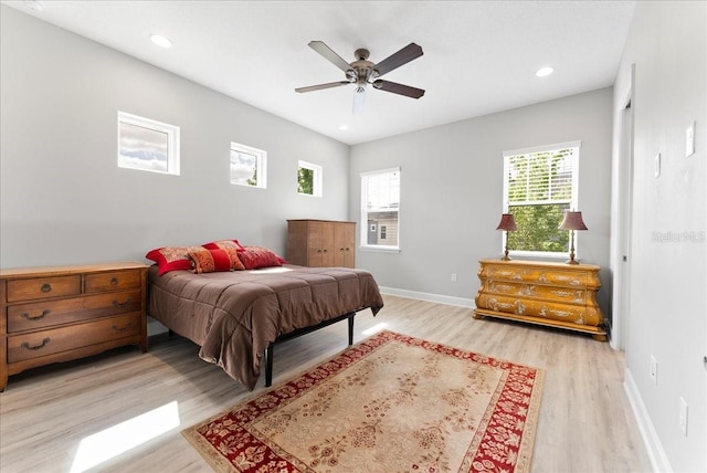 13865 Granger Ave, Orlando, FL 32827 - bedroom featuring light wood-type flooring, recessed lighting, baseboards, and ceiling fan