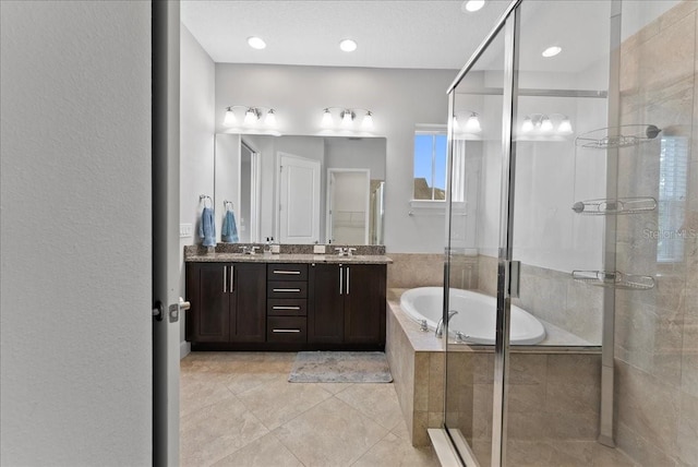 13865 Granger Ave, Orlando, FL 32827 - bathroom featuring double vanity, a sink, a bath, and a stall shower