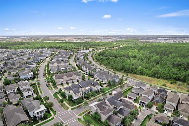13865 Granger Ave, Orlando, FL 32827 - drone / aerial view with a residential view and a forest view