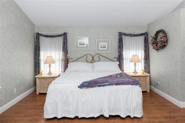 603 Yorkshire Dr, Oviedo, FL 32765 - bedroom with wood finished floors, multiple windows, and baseboards