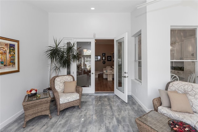 603 Yorkshire Dr, Oviedo, FL 32765 - sitting room featuring french doors, wood finished floors, and baseboards