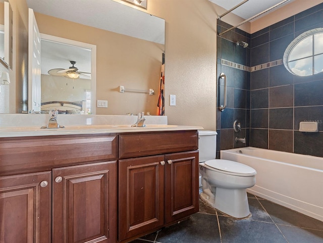 full bathroom featuring a sink, toilet, shower / washtub combination, tile patterned floors, and double vanity