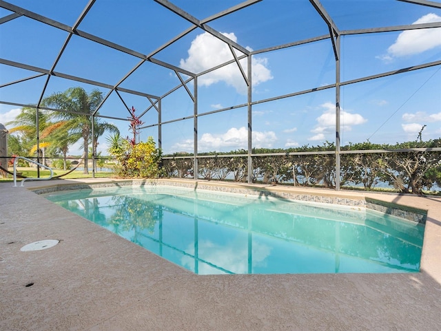 outdoor pool featuring a lanai