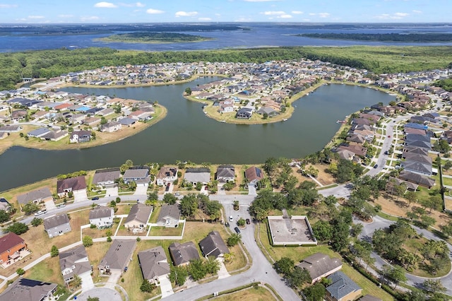 aerial view with a water view and a residential view