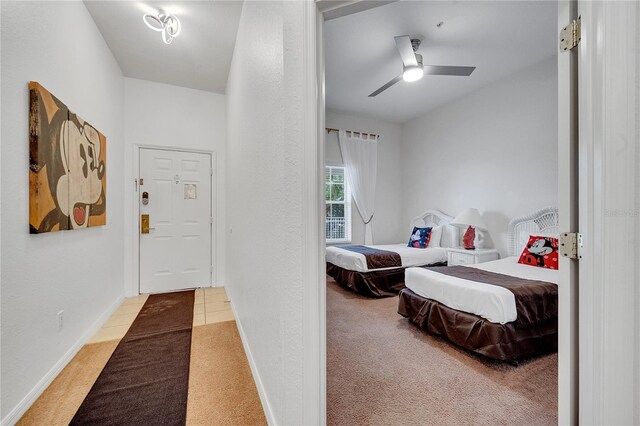 510 Rum Run Unit 33-510, Davenport, FL 33837 - bedroom with light colored carpet, baseboards, and a ceiling fan