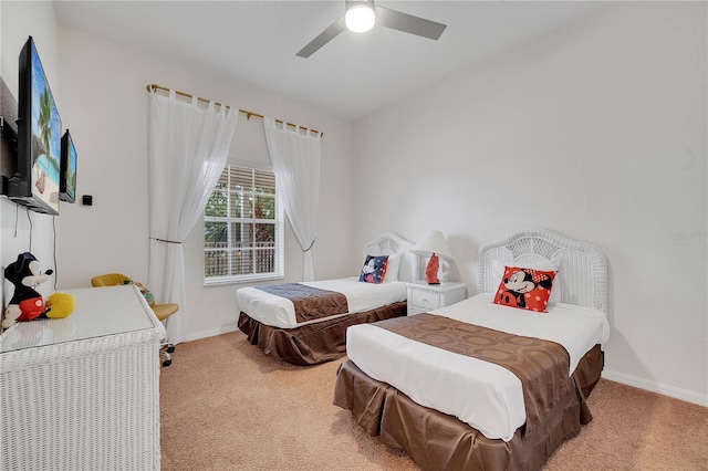 510 Rum Run Unit 33-510, Davenport, FL 33837 - bedroom with light carpet, baseboards, and ceiling fan