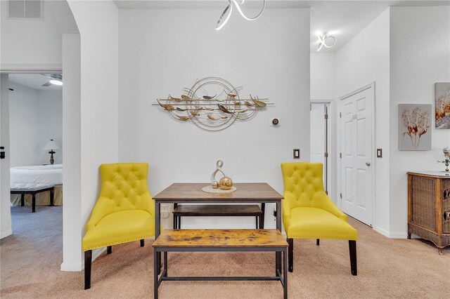 510 Rum Run Unit 33-510, Davenport, FL 33837 - living area with light carpet, arched walkways, and baseboards