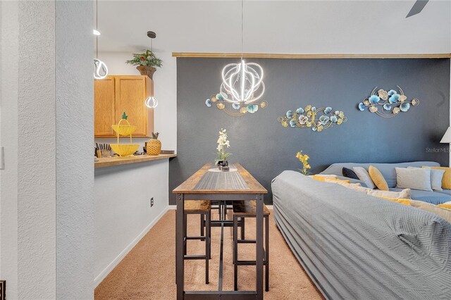510 Rum Run Unit 33-510, Davenport, FL 33837 - bedroom featuring carpet flooring, a chandelier, baseboards, and a textured wall