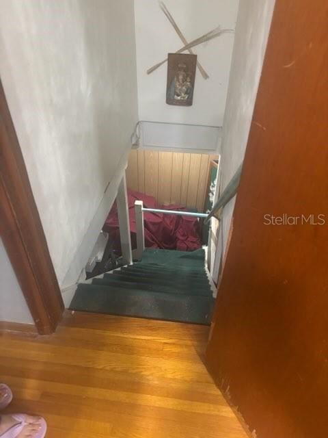 404 E Kentucky Ave, Deland, FL 32724 - stairway featuring wood finished floors