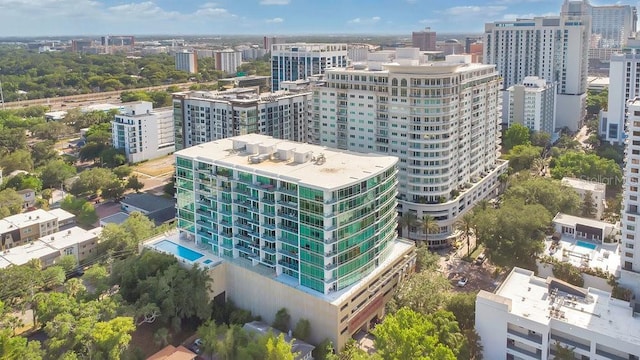 birds eye view of property with a view of city