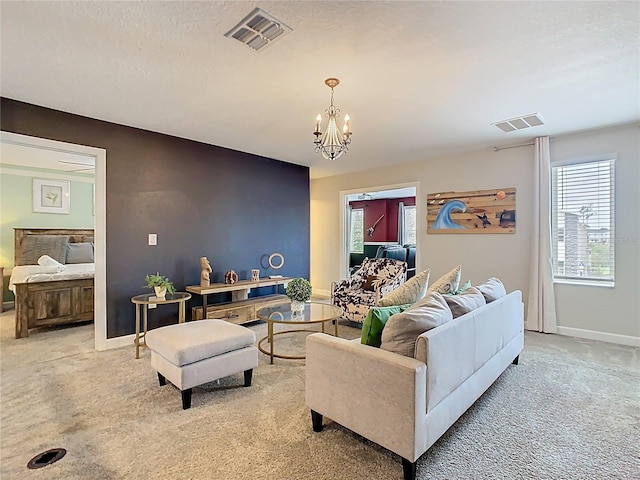 303 Ocean Course Ave, Davenport, FL 33896 - living area featuring visible vents, baseboards, and carpet floors