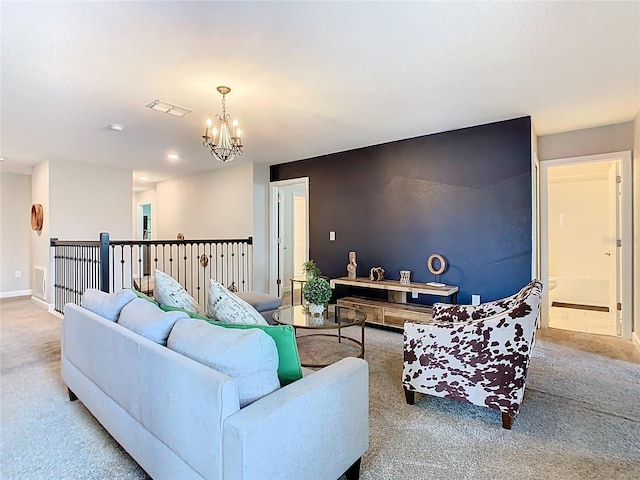 303 Ocean Course Ave, Davenport, FL 33896 - carpeted living area featuring visible vents, baseboards, and a notable chandelier