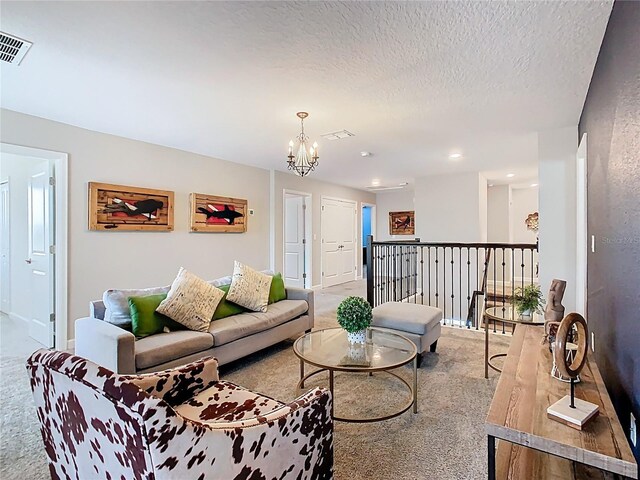 303 Ocean Course Ave, Davenport, FL 33896 - carpeted living area featuring a notable chandelier, visible vents, and baseboards