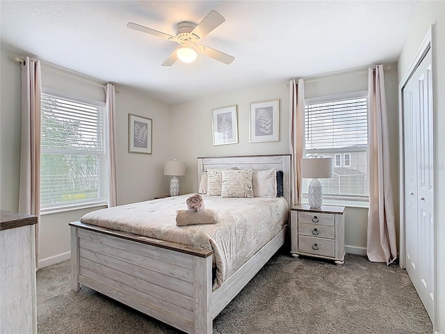 303 Ocean Course Ave, Davenport, FL 33896 - bedroom featuring baseboards, a ceiling fan, and carpet flooring