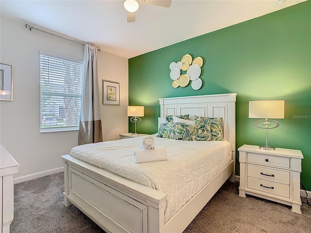 303 Ocean Course Ave, Davenport, FL 33896 - carpeted bedroom featuring baseboards and ceiling fan