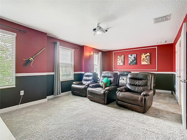 303 Ocean Course Ave, Davenport, FL 33896 - carpeted cinema room with visible vents and baseboards