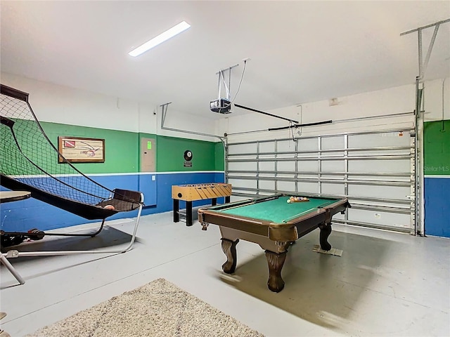 303 Ocean Course Ave, Davenport, FL 33896 - recreation room with concrete floors, a garage, and billiards