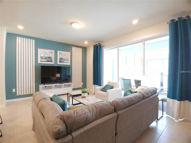 197 Jetty Way, Davenport, FL 33897 - living room featuring recessed lighting, baseboards, and light tile patterned flooring